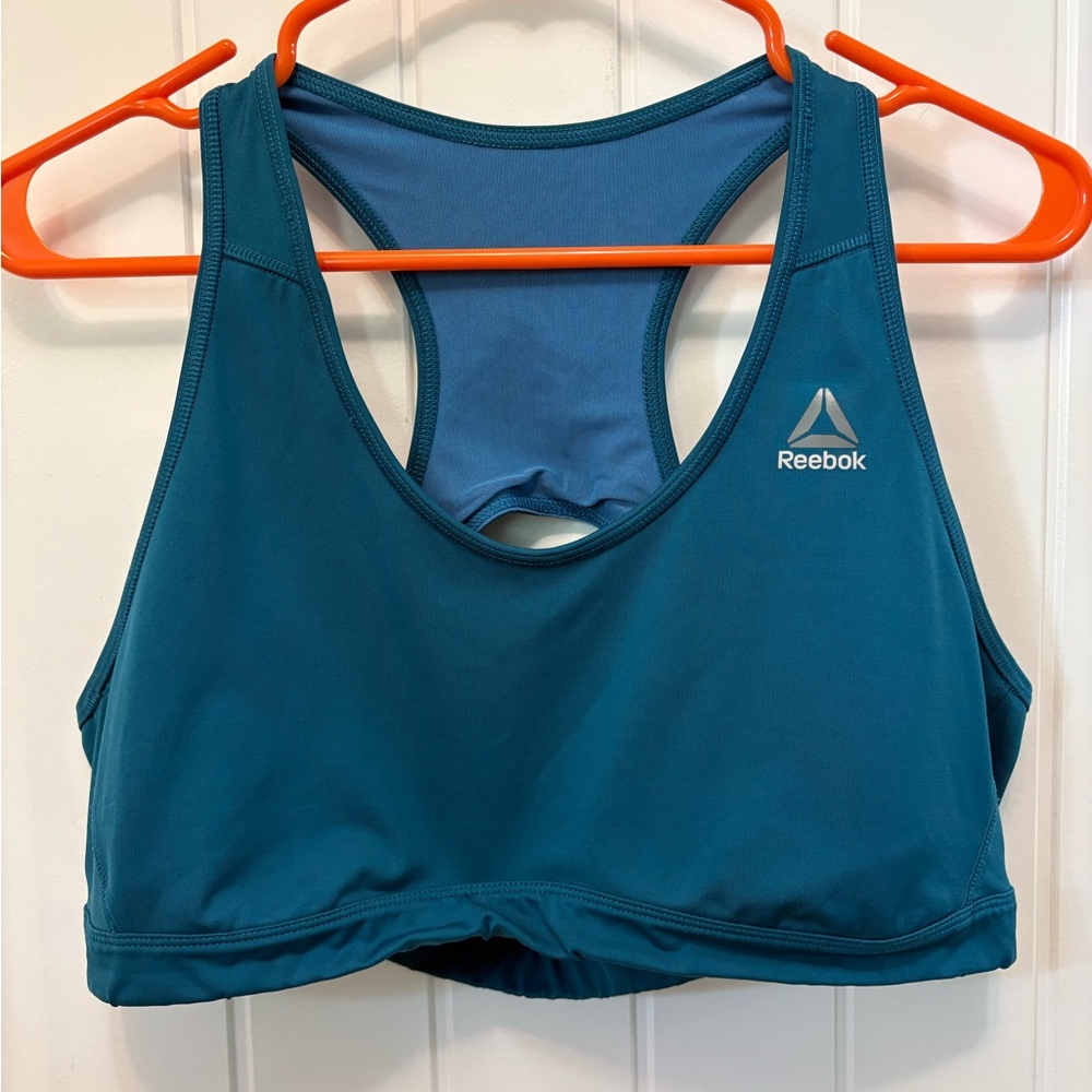 Reebok Teal Sports Bra with open back Y-detail. Size unknown. Speedwick